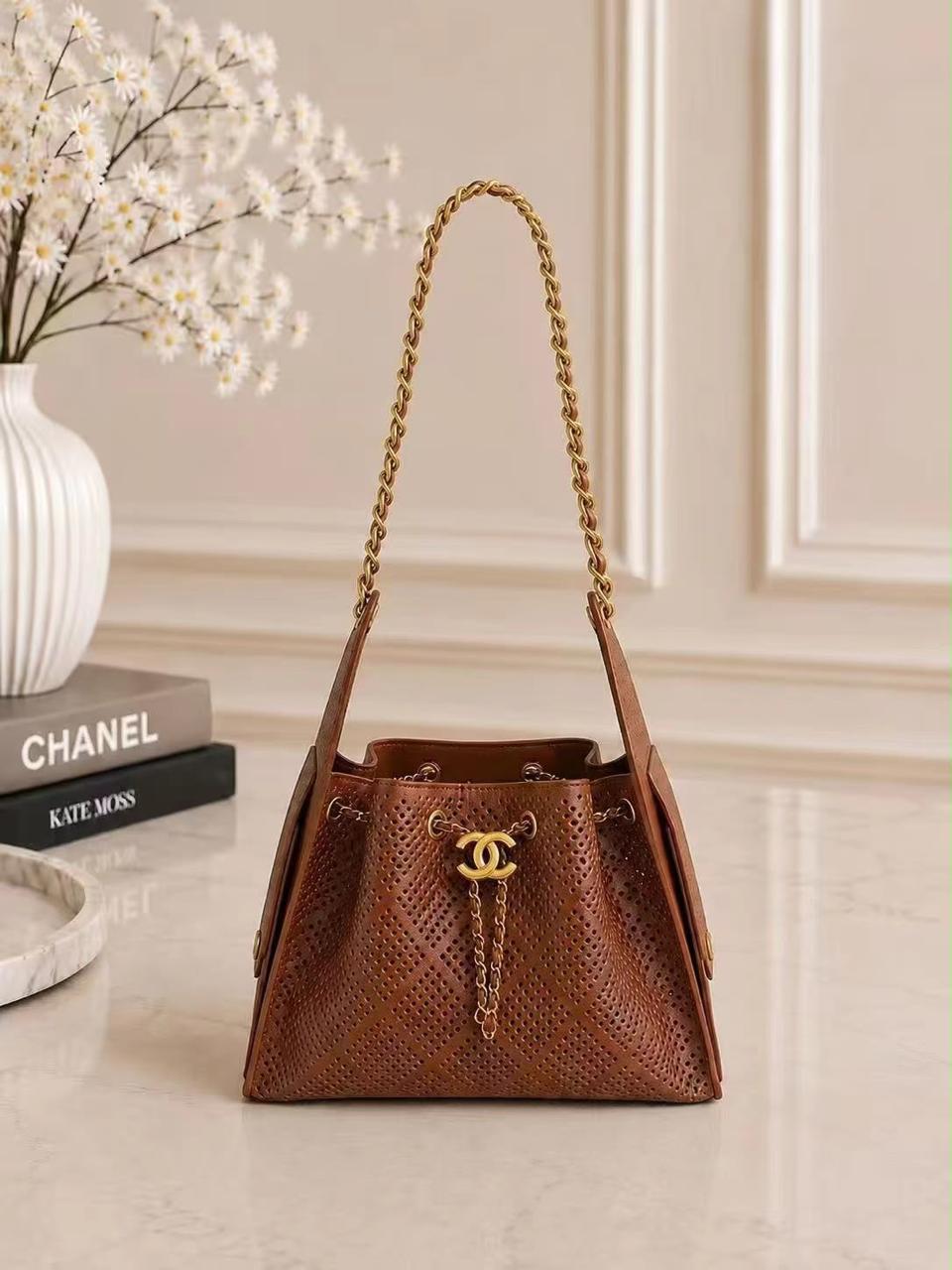 Chanel Perforated Drawstring Bucket Bag – Brown