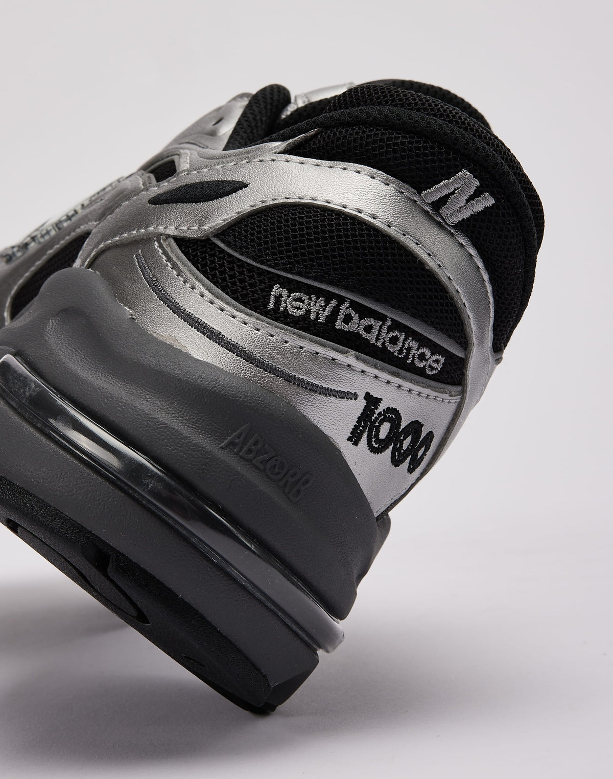 New Balance 1000 " black and metallic silver "