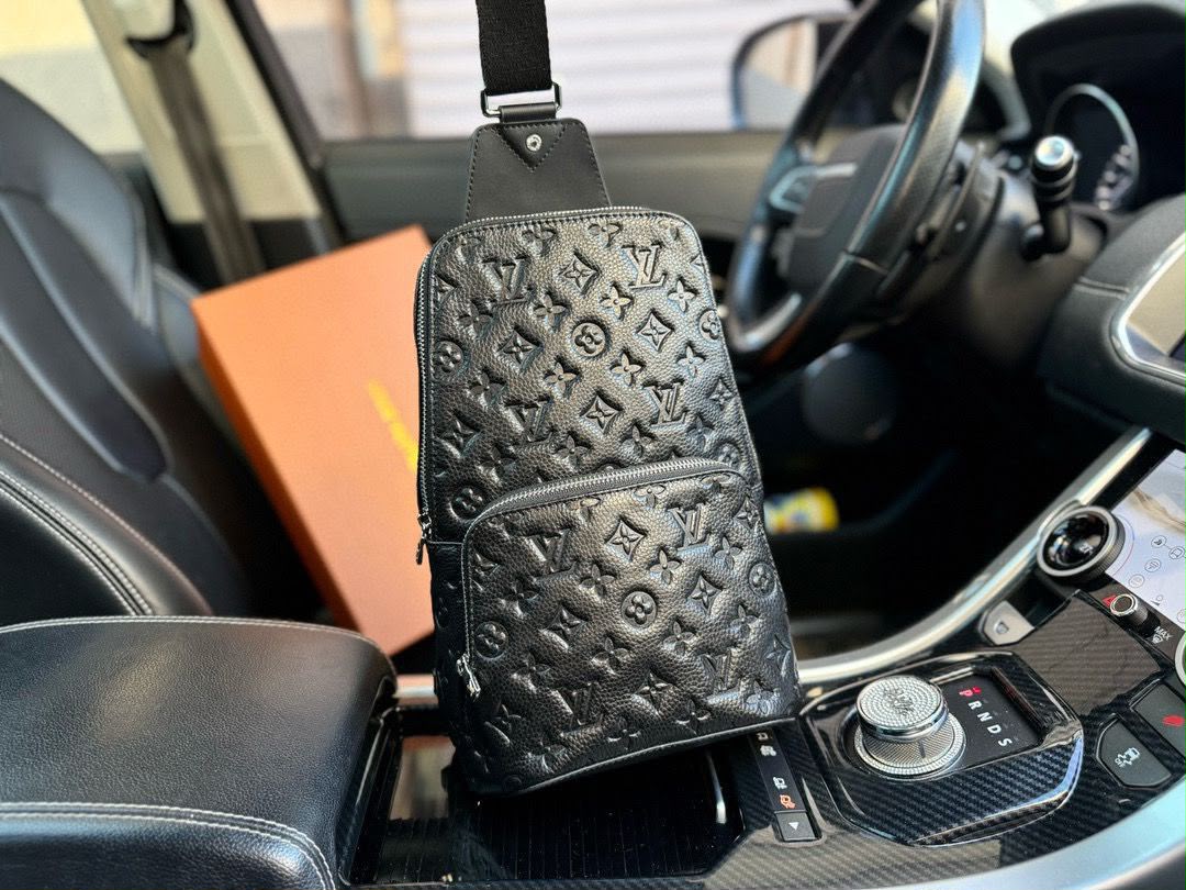 A black Louis Vuitton monogram crossbody bag