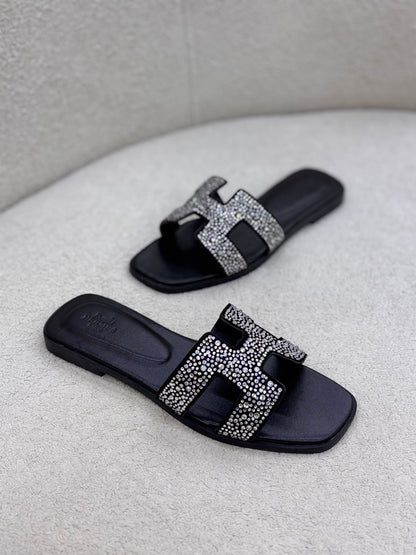 Hermès Oran sandals
 "Black"