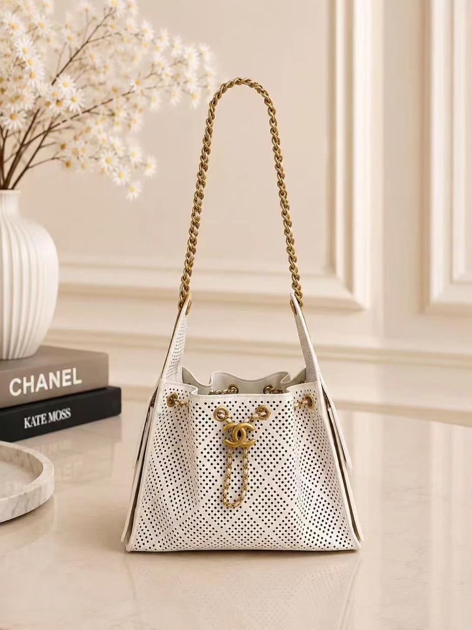 Chanel Perforated Drawstring Bucket Bag – White