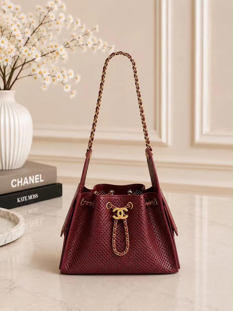 Chanel Perforated Drawstring Bucket Bag – Burgundy