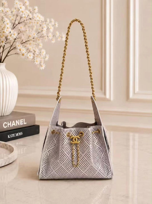 Chanel Perforated Drawstring Bucket Bag – Silver