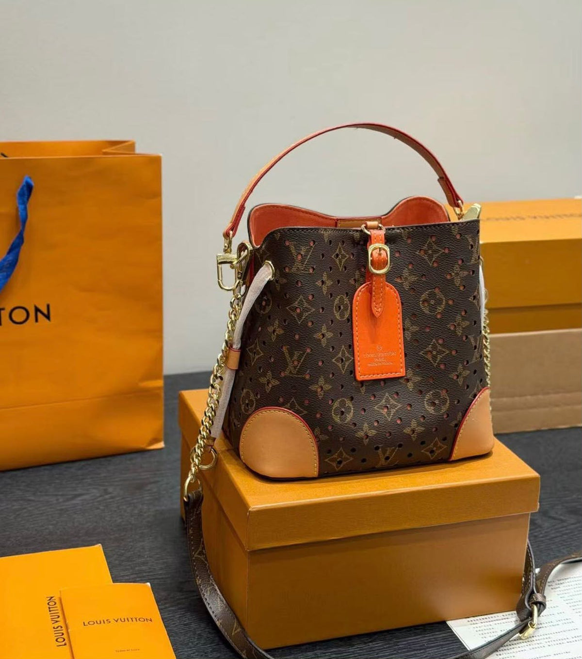 Louis Vuitton Monogram Perforated Bucket Bag "Orange Trim"