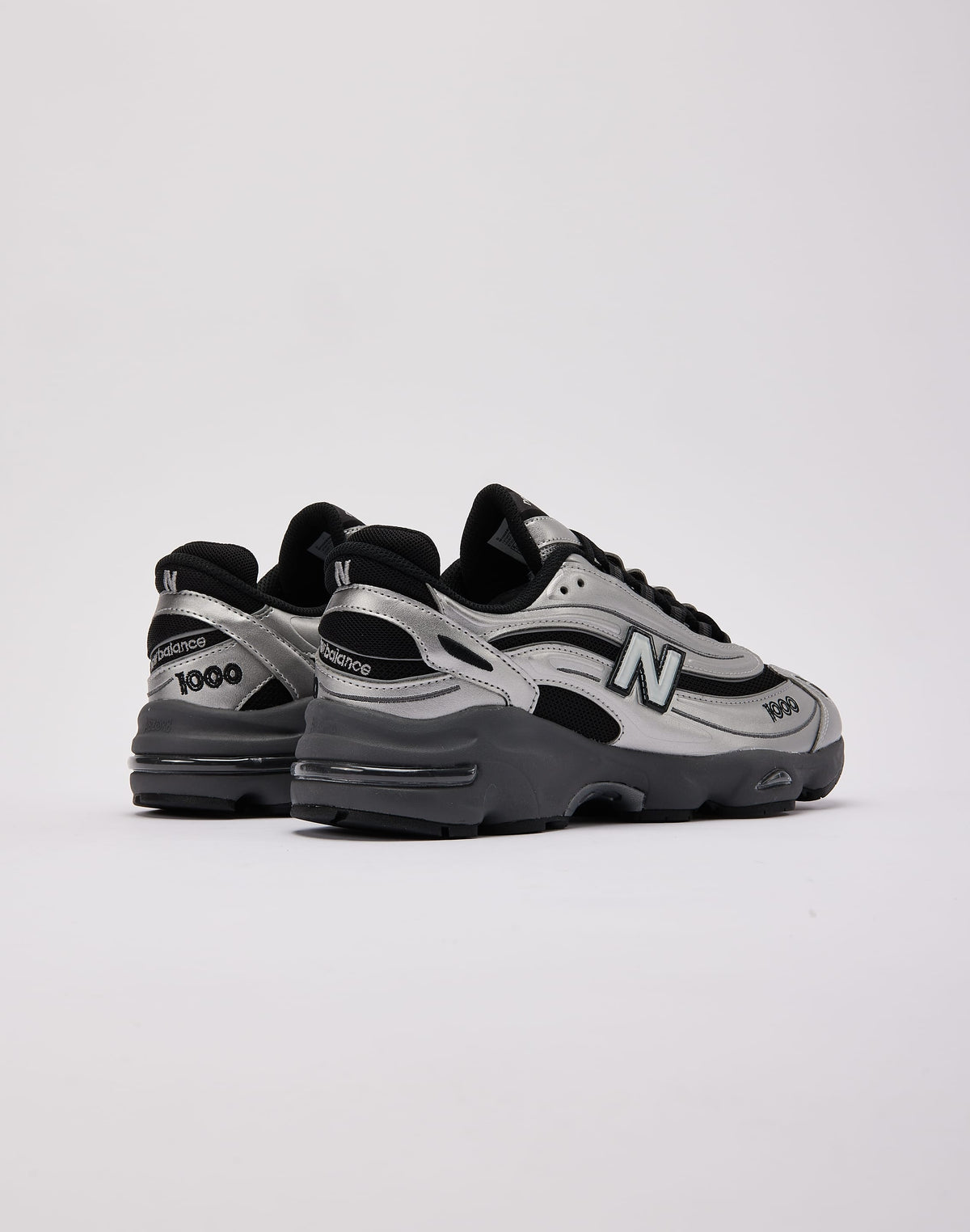 New Balance 1000 " black and metallic silver "
